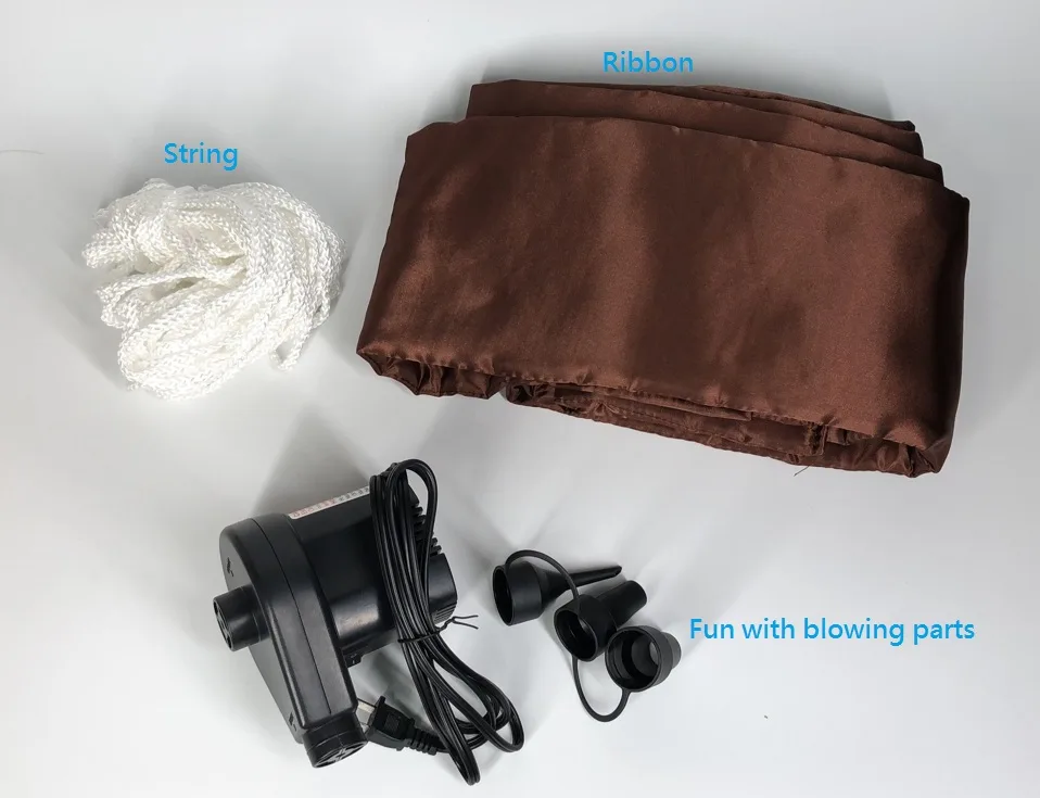 The kit that ships with the bear: an electric air pump with three nozzles, a coil of white tether cord and a folded brown satin ribbon